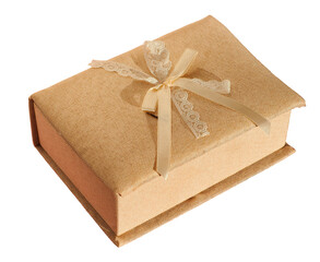 A golden-colored gift box made of textured fabric with a ribbon bow, isolated on a transparent background
