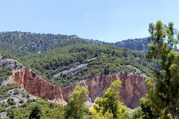 mountains, some of which have been shaved for the purpose of mining.