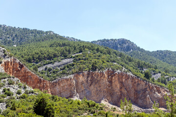 Fototapeta na wymiar mountains, some of which have been shaved for the purpose of mining.