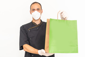 Food delivery in the restaurant. The chef packs food