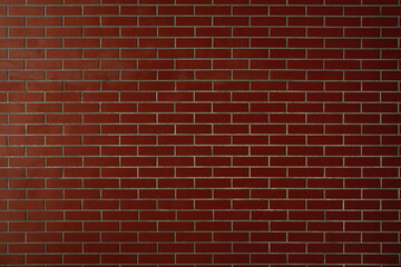 Brick wall background. Pattern brown color design decorative uneven cracked real stone wall surface with cement. Dry brick wall as seamless background