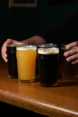 barman serving beers 