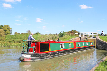 Naklejka premium Narrow boats in the Caen Hill canal locks, Devizes, England