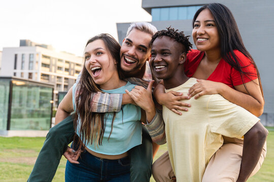 Young diverse people having fun together outdoor - Focus on native american girl face - Powered by Adobe
