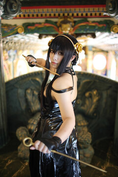 Portrait of a beautiful young woman Cosplay with Spy dress