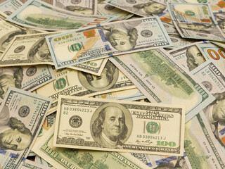 100-dollar bills close-up view from above.