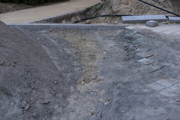 Pavement rocks, stones and cobblestone blocks, construction of path, road or sidewalk