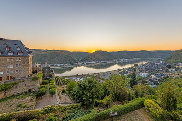 Fototapeta na wymiar Drone panorama over St. Goar and St. Goarshausen during sunrise