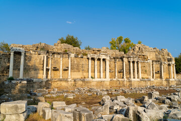 Fototapeta na wymiar Remains of Monumental Fountain (Nymphaeum) in Side, Turkey
