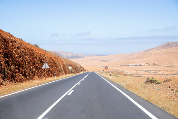 Scenic View of a Highway on a Desert Landscape in Fuerteventura, Canary Island.Copy Space