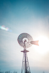 Weathervane in the sun on a clear winter day - obrazy, fototapety, plakaty