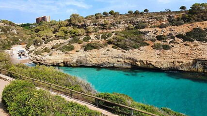 Sea view in Calas de Mallorca resort (or Cales de Mallorca) near Cala Antena beach hide at the rocky coast, Mallorca (Majorca), Spain.