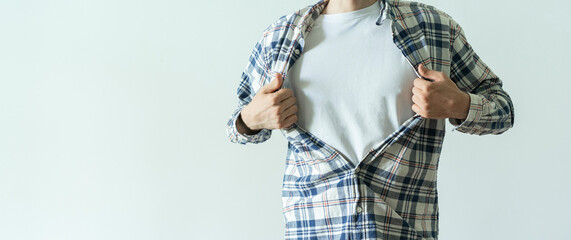 strong person breaks his shirt and opens shirt as a super hero, template mockup