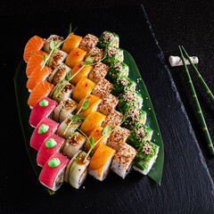 tasty sushi on the black background