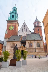 Fototapeten Wawel hill with cathedral and castle in Krakow. Clock tower © k_samurkas