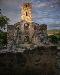 Sunset over the medieval ruins of a temple at lake Balaton, Hungary