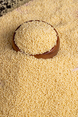 Fresh raw porridge couscous from wheat or millet