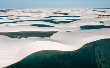 aerial view of the white sand dunes of Lencois Maranhenses with rain water pools