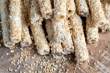 waffle tube with chocolate filling and crushed peanuts