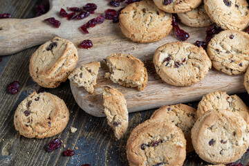 delicious dried cookies made of high-quality flour with dried red cranberries on the table
