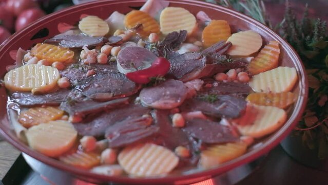 Close-up of national Kazakh dish Beshbarmak made of veggies