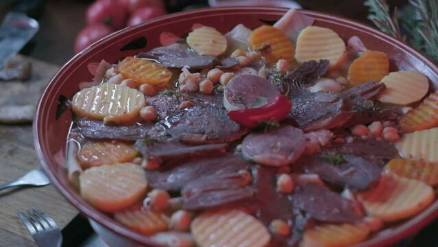 Close-up of national Kazakh dish Beshbarmak made of veggies