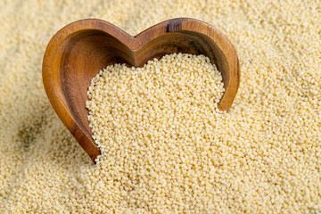 Fresh raw porridge couscous from wheat or millet