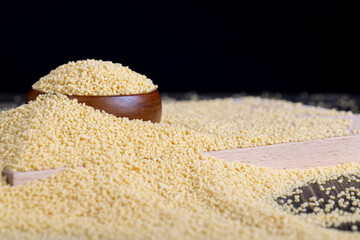 Fresh raw porridge couscous from wheat or millet
