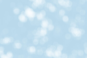 Abstract light blue blur bokeh for background, light blur on high light blue gradient abstract background in central design for presentation.