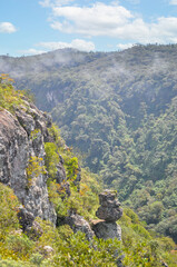 Fototapeta na wymiar Secret Stone (Pedra do Segredo) at Itaimbezinho Canyon, Cambara do Sul, Rio Grande do Sul, Brazil. Misty landscape in a sunny day