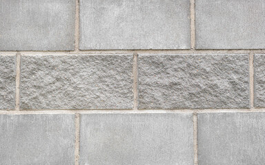 Stone gray brick blocks wall of different textures background
