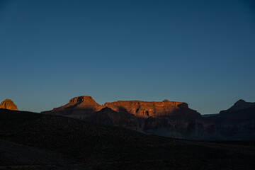 Morning Light Strikes The Upper Elevations of Grand Canyon