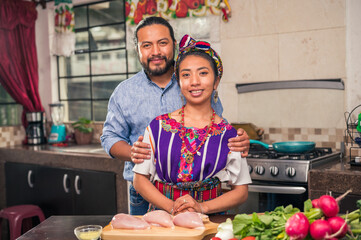 couple cooking together. Hispanic young couple in the kitchen.
Latino husband and wife in the...