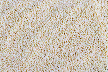 Fresh raw porridge couscous from wheat or millet