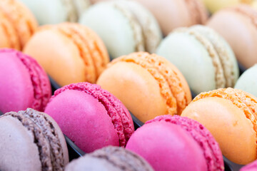 Close up of colorful  french macarons. in the box package.