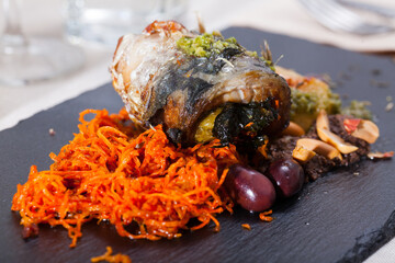 Appetizing mackerel roll with carrots and lard. High quality photo