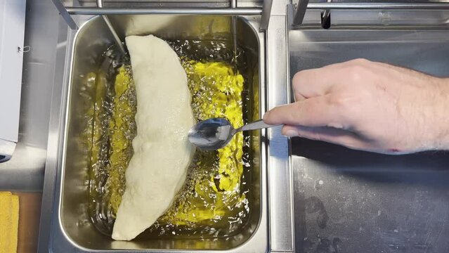 Cooking panzerotti famous Italian bread 3-4