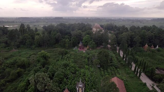 Drone footage above a pagoda, the Wat Krapum Pech in silk island, close to Phnom Penh city, Cambodia 2-4