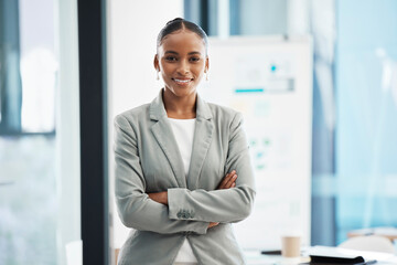 Proud, formal corporate businesswoman with arms crossed showing professional leadership, in marketing strategy presentation. Smiling employee standing in company boardroom for business meeting