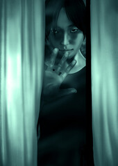 Fototapeta na wymiar 窓の外から覗く睨む怖い女の子 緑