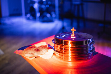 The process of breaking bread in the modern church. Breaking bread ceremony in protestant church....