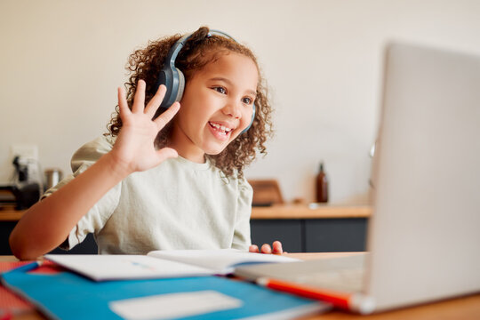 Online, Distance Learning Child On Laptop Webcam Or Video Call Joining Lesson With Headphones And Hello Greeting Or Goodbye Gesture. Little Happy Student In Remote Classroom With A Teaching Notebook