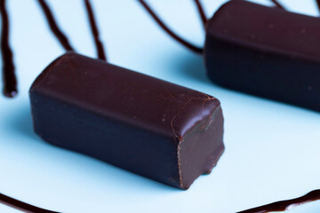 Chilled cottage cheese with sugar in chocolate