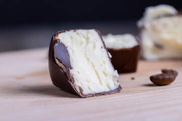 Chilled cottage cheese with sugar in chocolate