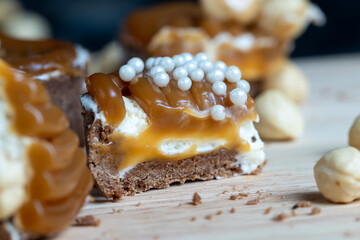 chocolate tartlet with cream filling and salted caramel with nuts