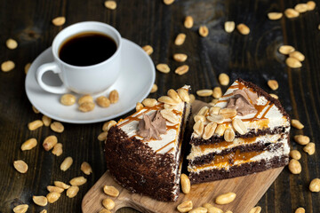caramel cake with peanuts and buttercream, close up