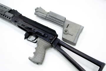 Detail of a weapon printed on a 3D printer. A weapon detail printed on a 3D printer from powder...