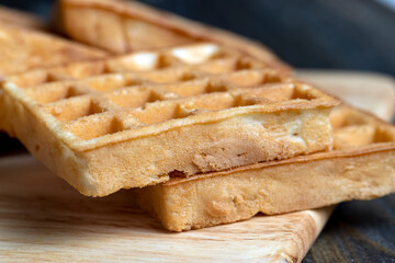 square sweet soft waffles on the table
