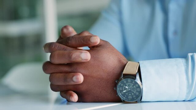 Nervous hands, anxious and worried businessman fidget with finger feeling stress, uncertain and overwhelmed waiting for job interview. Fingers of worker with adhd feeling unsure, scared and pressure