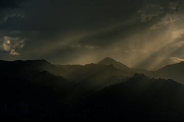 Smog contamination pollution in the mountains of the city of medellin colombia antioquia red and dirt